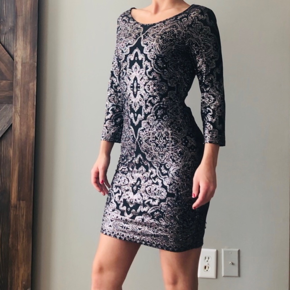 Sparkly form fitting black dress!